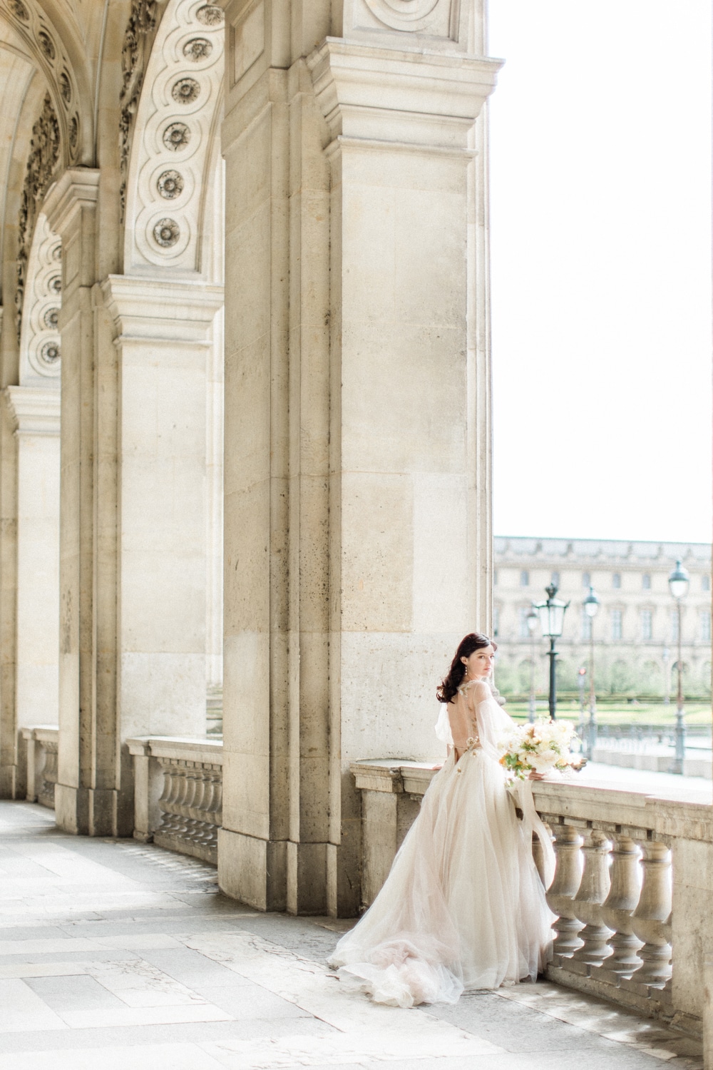 French bride in Paris with the magnificent architecture and a gorgeous antic gown