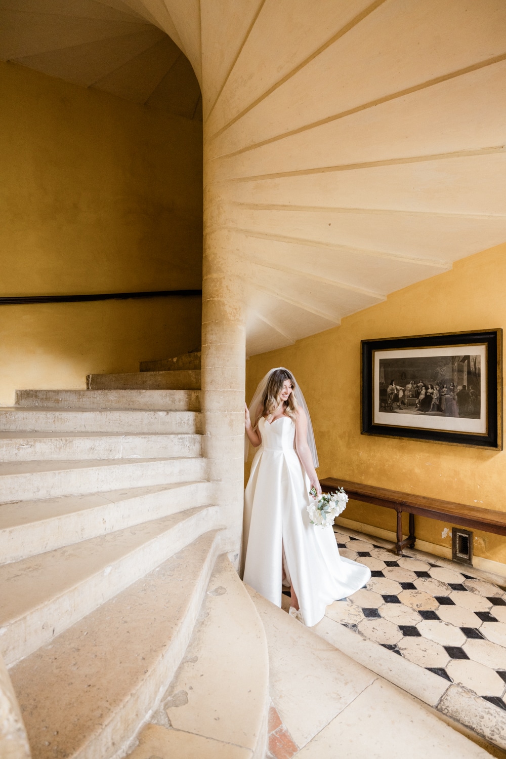 Timeless bridal moment on the staircase of Château de Vallery