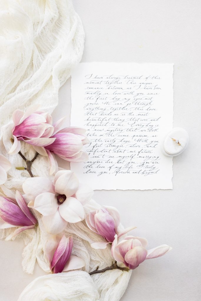 Wedding Vows Flatlay with Magnolias