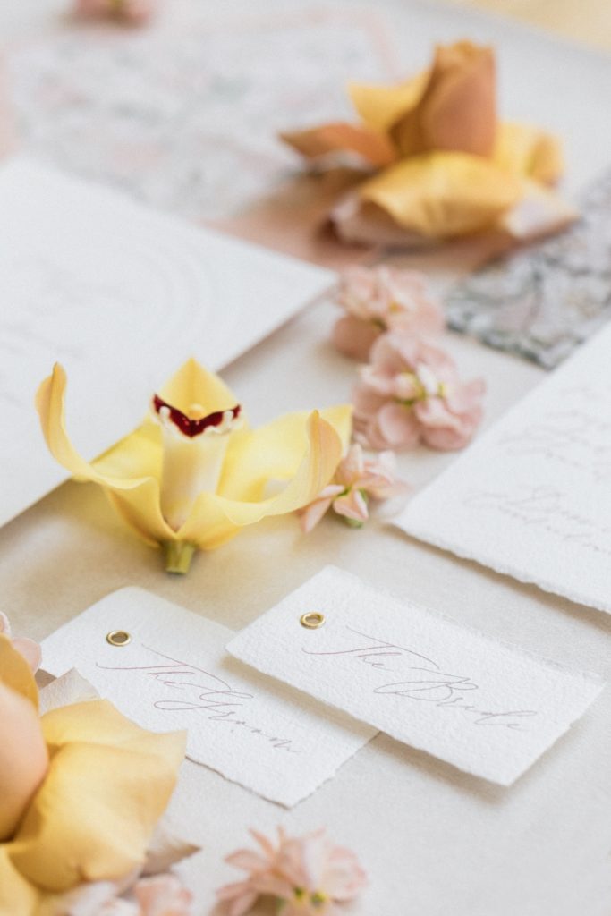 Flatlay stationery with the guests tags