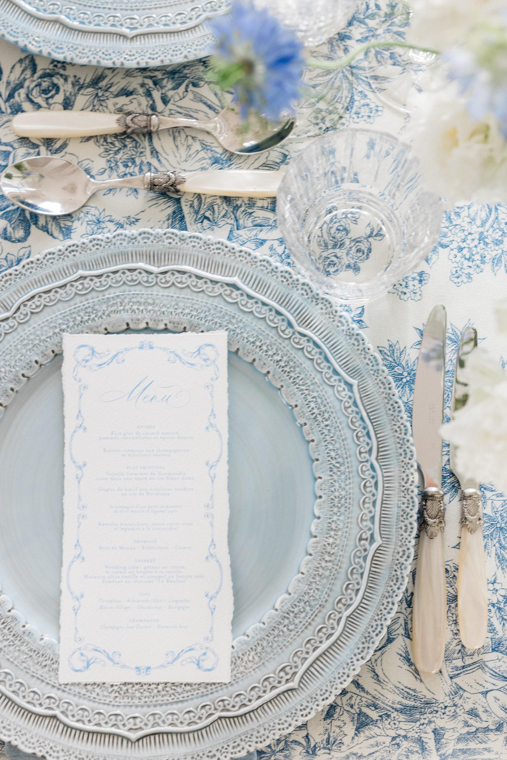 Blue, sage green and gold wedding reception decor