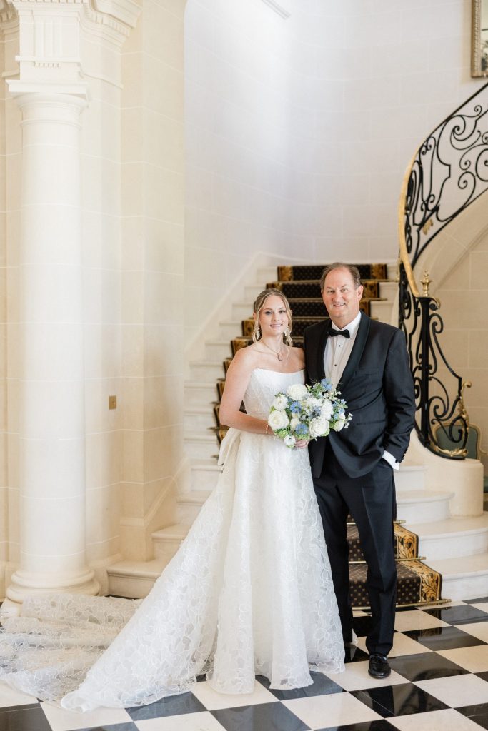 Bride sharing a joyful moment with her father before the ceremony