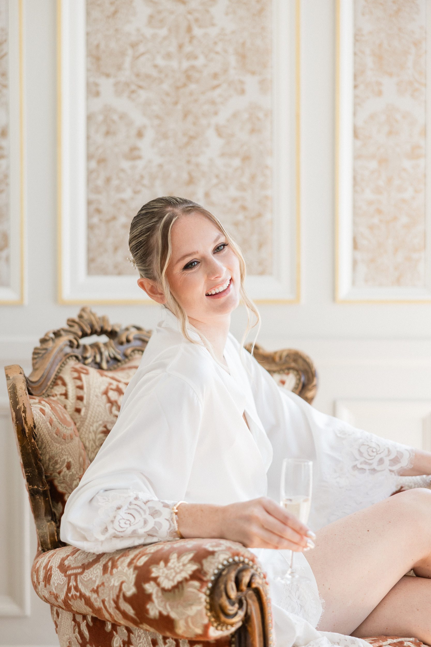 the bride sharing a joyful moment with her bridesmaids before the ceremony