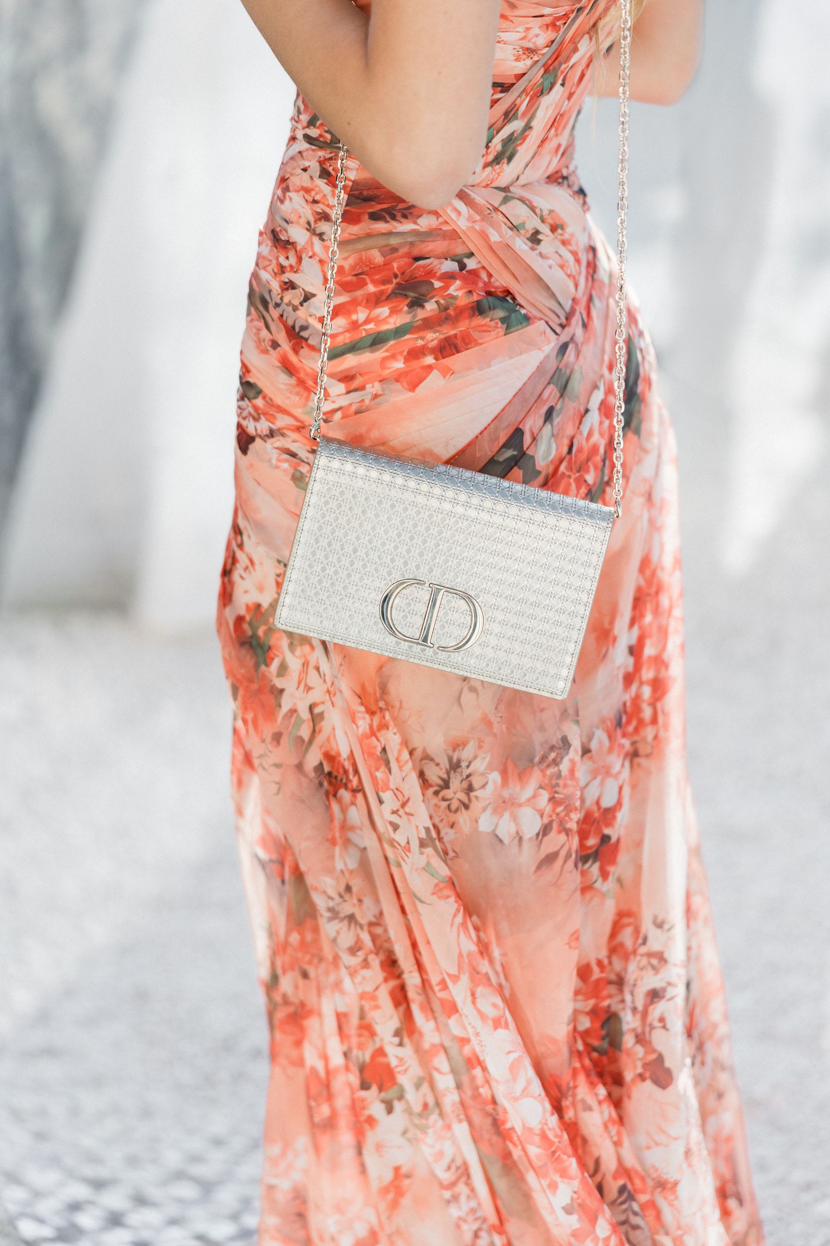 Luxury handbag detail at an elegant French château wedding