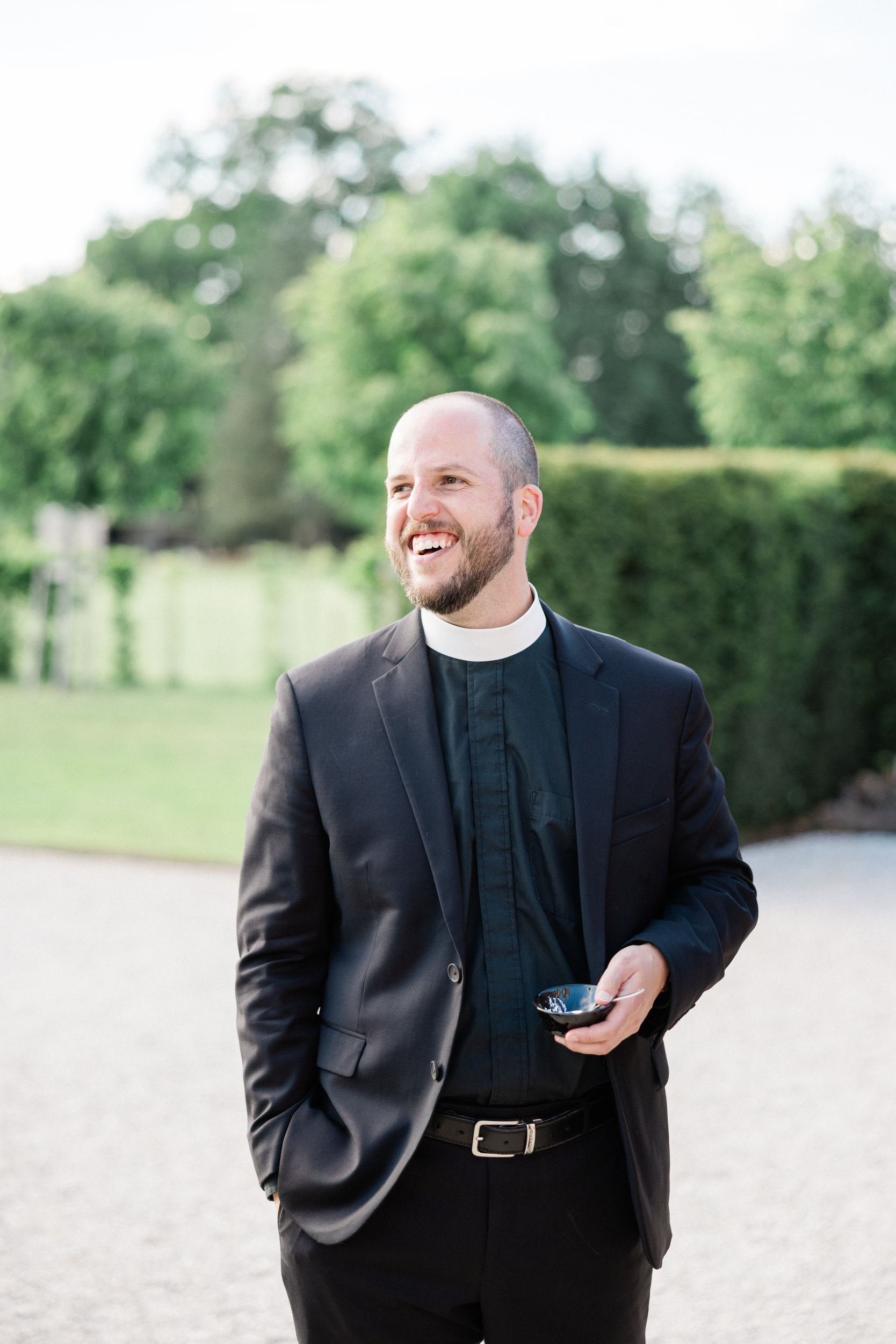 Smiling wedding guest during the reception in France