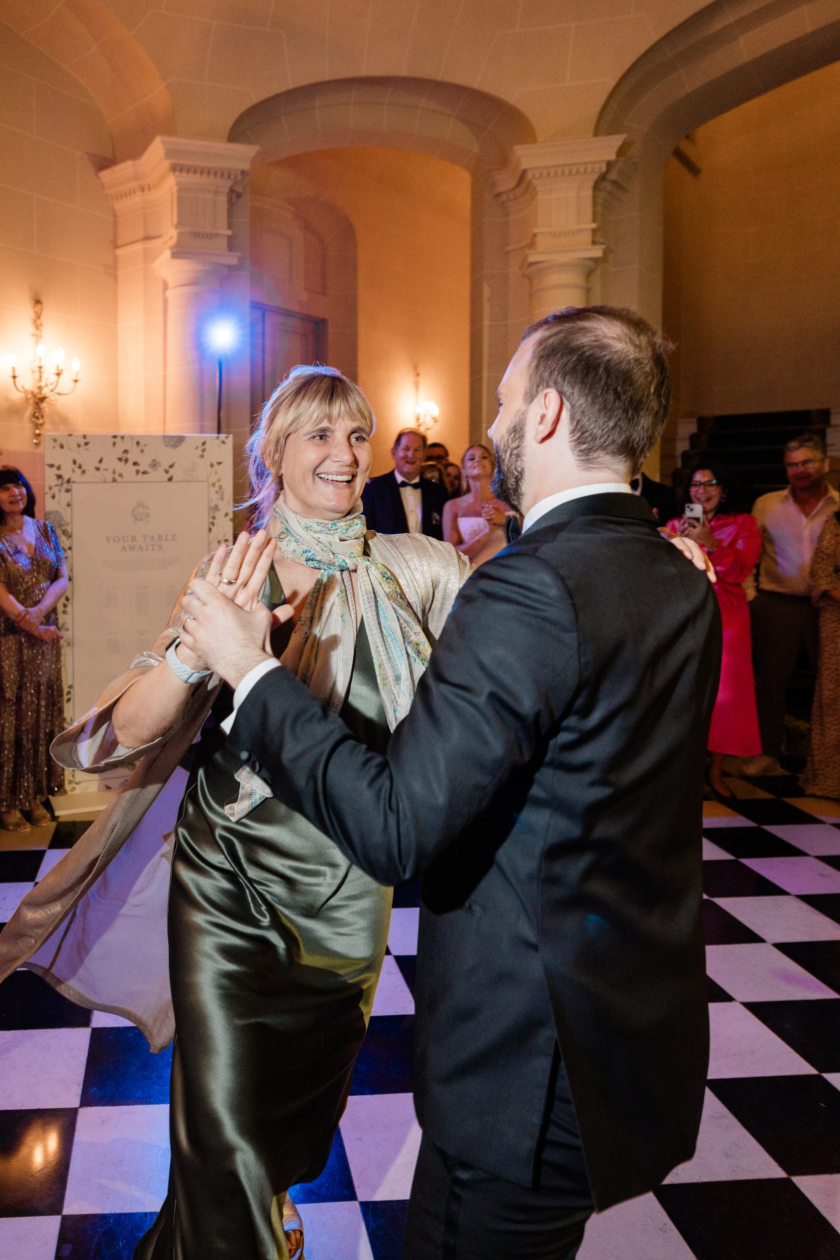 Groom celebrating during the wedding reception at Château de Nainville-les-Roches